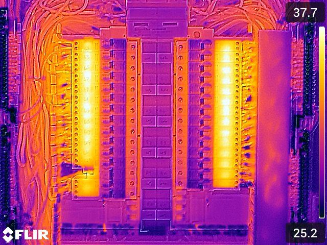 Thermal image of a switchboard with two warm vertical terminal sections