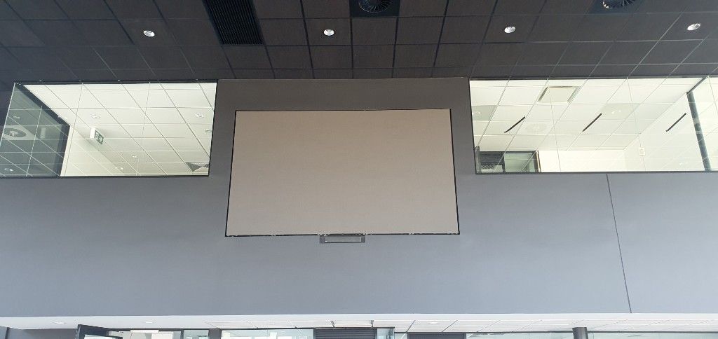 Finished indoor video wall in a commercial lobby, with the face blank